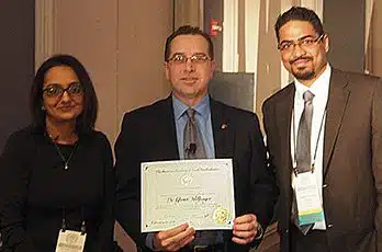 Photo taken at the AAFP February 2018: Drs Sangeetha Raghavendra and Avi Bidra, Prosthodontists from Connecticut pictured with Dr. Wolfinger