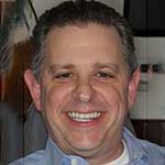 Post-treatment smile following crown treatment